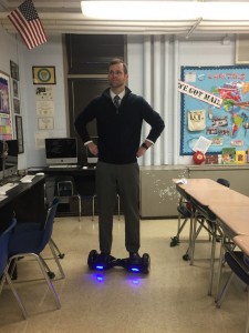 my teacher, Mr. Haney, on his new Hoverboard.